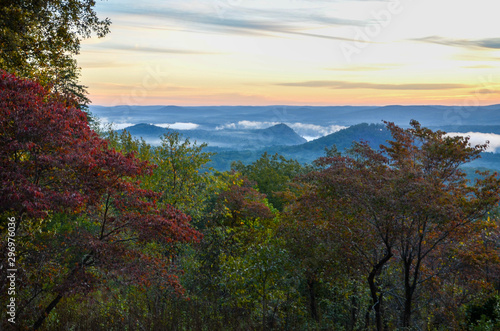 View of the fog covered valley below. Taken from the top of Morrow Mountain State Part NC