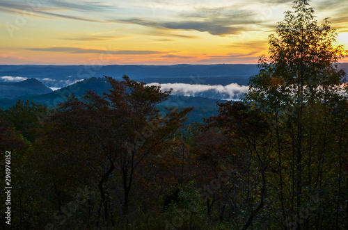 View of the fog covered valley below. Taken from the top of Morrow Mountain State Part NC © Rick