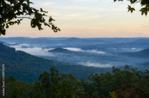 View of the fog covered valley below. Taken from the top of Morrow Mountain State Part NC