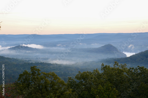 View of the fog covered valley below. Taken from the top of Morrow Mountain State Part NC