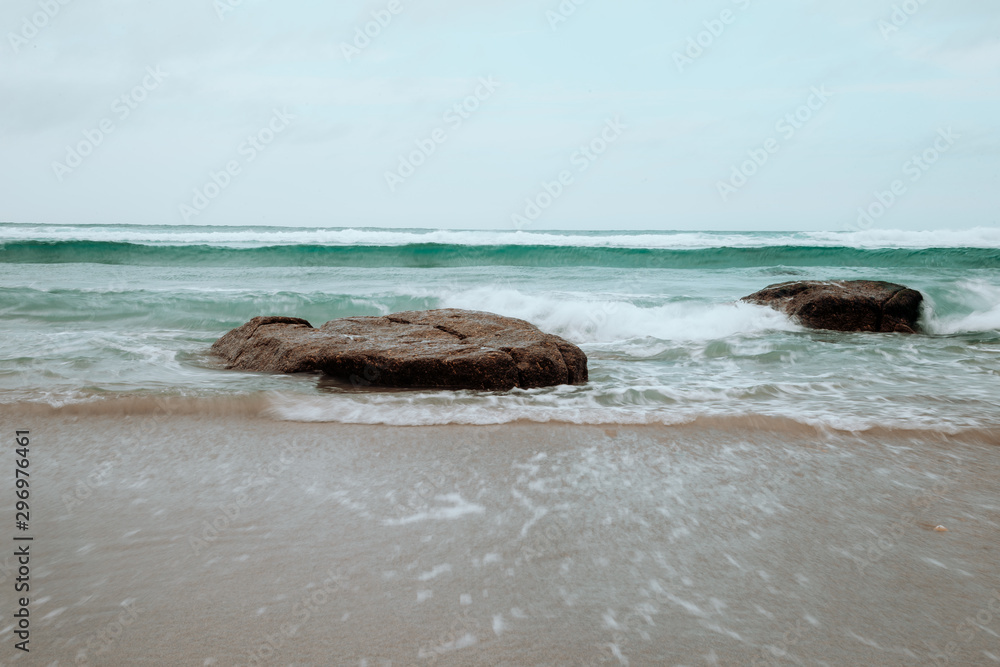 Fototapeta premium rocks on the shore of the beach