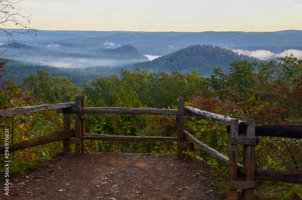 View of the fog covered valley below. Taken from the top of Morrow Mountain State Part NC