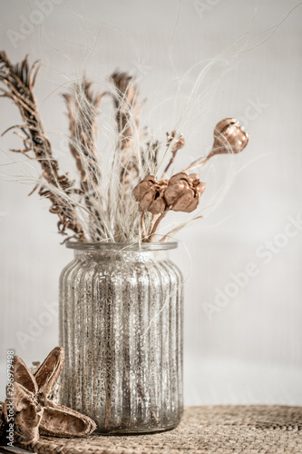 Still life beautiful vase with dried flowers .