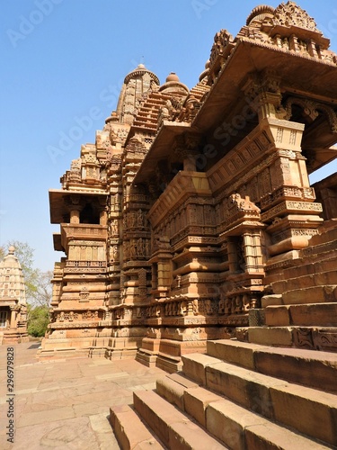 The Western group of Khajuraho temples, on a clear day, Madhya Pradesh India is a UNESCO world heritage site, known for Kama Sutra sex scenes and erotic figures.
