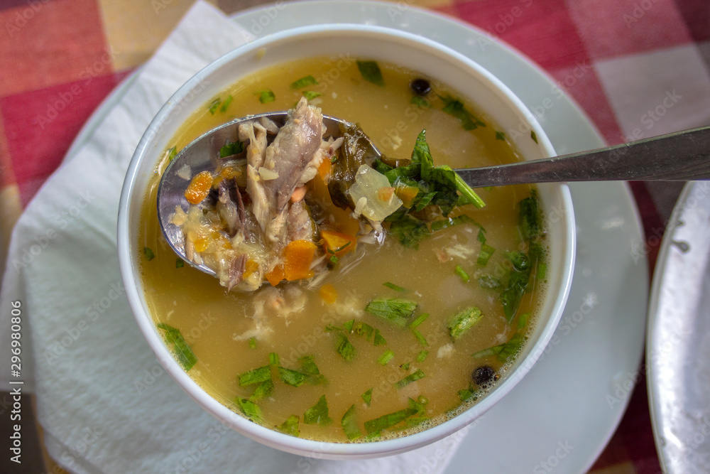 Closeup of a serving of veal soup with vegetables. Closeup of a serving of veal soup with vegetables.