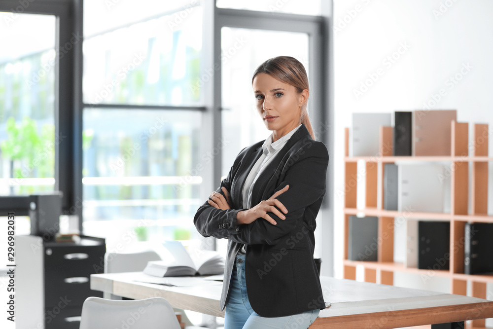 Portrait of female business trainer in office wear at workplace Portrait of female business trainer in office wear at workplace