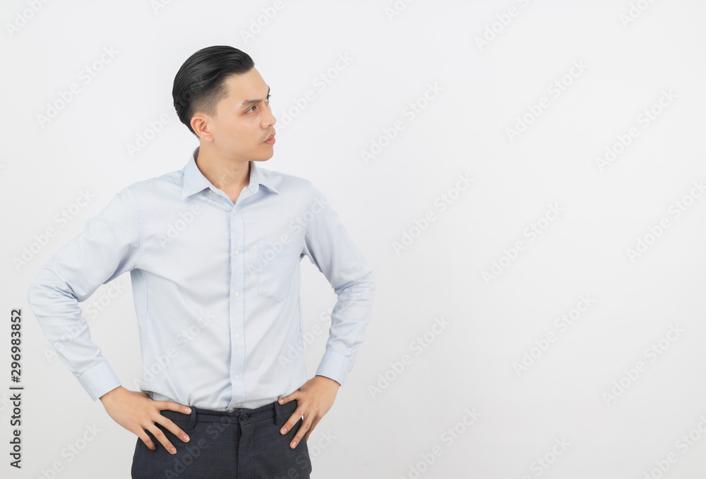 Young handsome asian business man thinking an idea while looking up isolated on white background. Young handsome asian business man thinking an idea while looking up isolated on white background.
