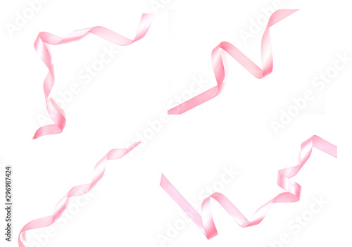 Set curled pink ribbon with highlights isolated on white background, top view