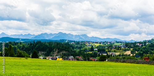 Loose housing in Podhale with the Tatra Mountains in the background.