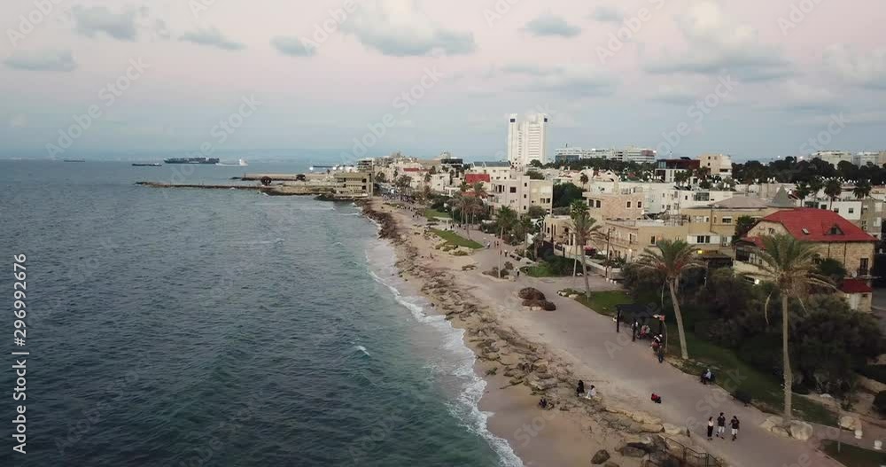 Promenade along the coast and in the background of residential houses. Aerial View. Promenade along the coast and in the background of residential houses. Aerial View.