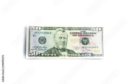 American dollars denominations of one hundred, fifty, five. Arranged in a chaotic manner, a short flight of stairs, a bill on a bill. Old sample and new notes. Dollars in hands are twisted into a tube