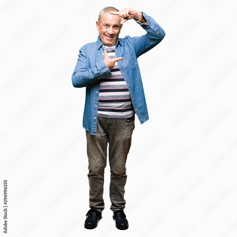 Handsome senior man wearing denim jacket smiling making frame with hands and fingers with happy face. Creativity and photography concept. Handsome senior man wearing denim jacket smiling making frame with hands and fingers with happy face. Creativity and photography concept.
