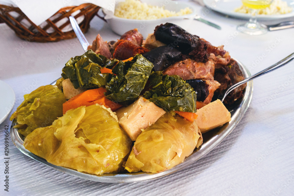 Fototapeta premium The famous traditional dish of the Azores is Cozido das Furnas. Vegetables and meat are cooked for a long time in hot volcanic soil..Traditional portuguese food, Azores cuisine, San Miguel, Portugal.