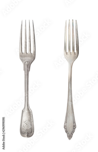 Beautiful old vintage forks isolated on white background. Top view. Retro silverware.