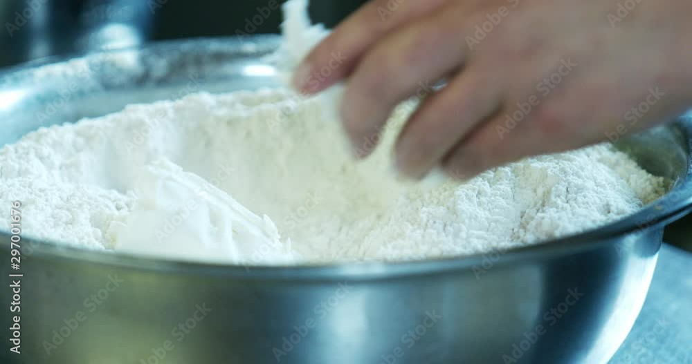 Flour in a metallic bowl 4k Flour in a metallic bowl 4k