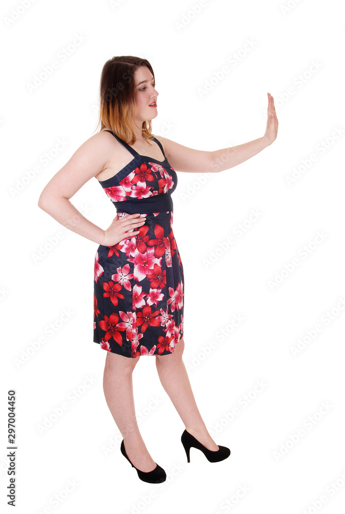 Pretty woman standing in colorful dress saying NO Pretty woman standing in colorful dress saying NO