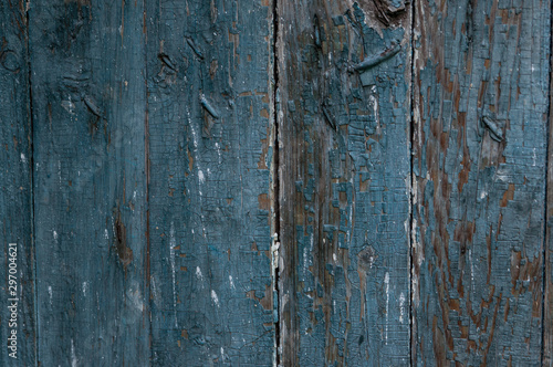 Blue wooden boarded wall with cracked paint background