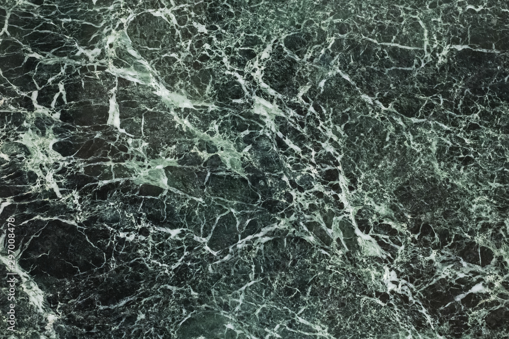 Fototapeta premium The dark green marble. Facing stone. Texture