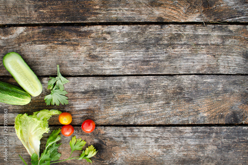 Tasty summer camping food on wooden table background photo