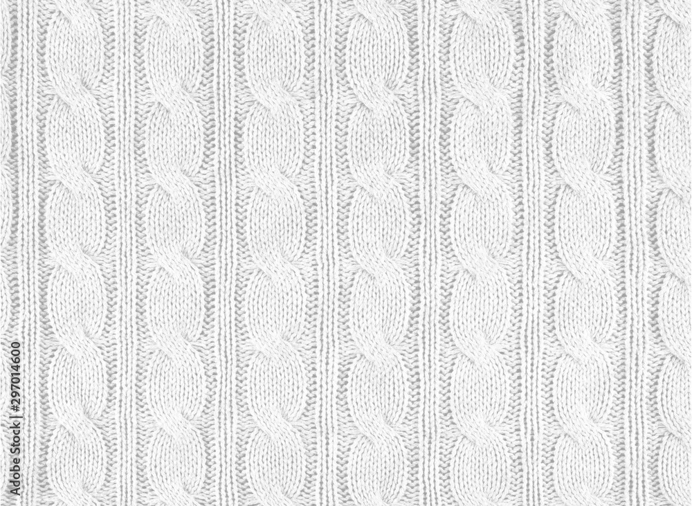 White knitted textured background with a pattern, acrylic and cotton knit fabric, closeup