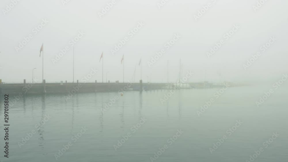 Lighthouse in the port of a city