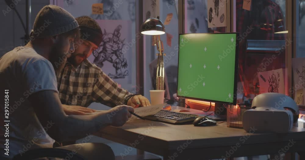 Video game developers discussing project