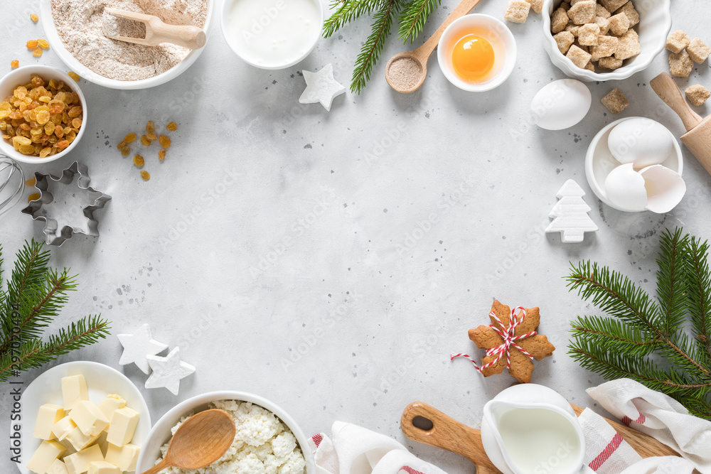 Christmas or Xmas baking culinary background. Ingredients for cooking pastry on kitchen table, recipe. New Year, X-mas or Noel holiday festive decorations. Greeting card with fir tree and copy space Christmas or Xmas baking culinary background. Ingredients for cooking pastry on kitchen table, recipe. New Year, X-mas or Noel holiday festive decorations. Greeting card with fir tree and copy space