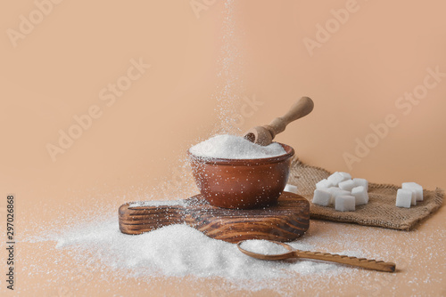 Sprinkling of sugar into bo...