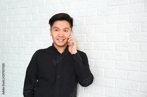 Portrait of stylish Asian m...