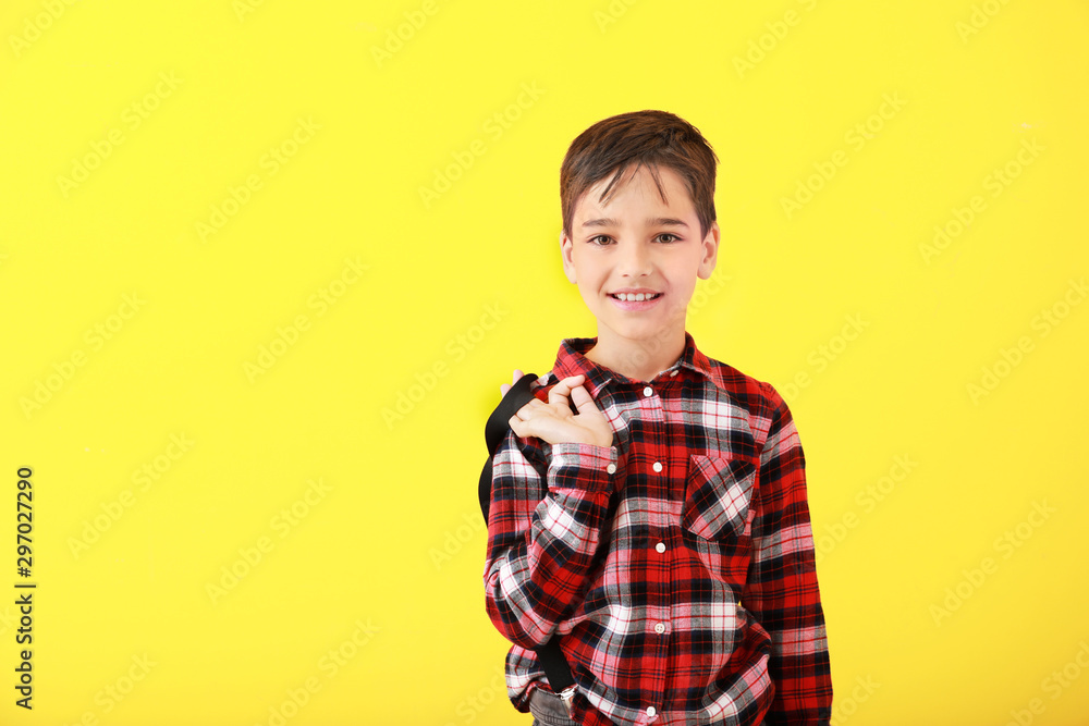 Cute fashionable boy on color background Cute fashionable boy on color background