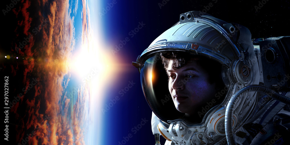 Spaceman and planet, human in space concept