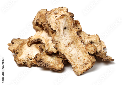 The root of angelica dahurica used in traditional Chinese medicine, on a white background photo