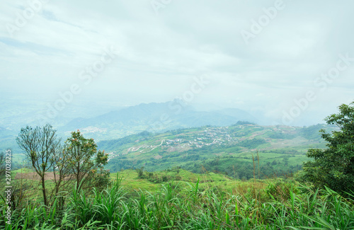 Landscape View fog On The Mountain Breathe fresh air have die grass forground and villa hill