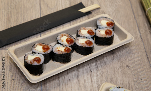 Japanese food sushi Cheese Maki with violet jam Top view of sushi. Hosomaki Sushi Roll