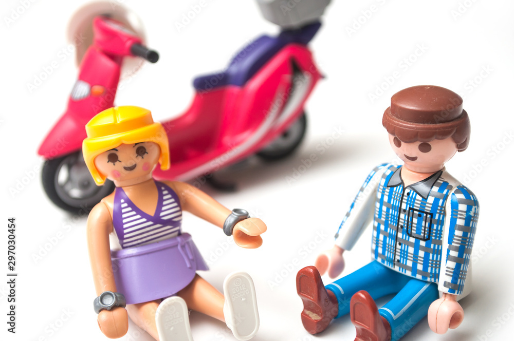 Mulhouse - France - 20 October 2019 - Closeup of Playmobil figurines  sitting near red scooter on white background Stock Photo | Adobe Stock