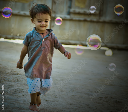 beautiful view of Punjabi kid playing  photo