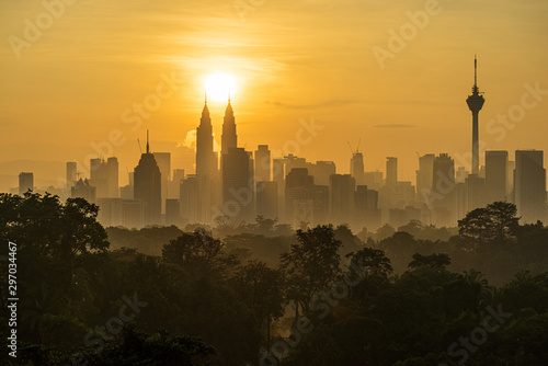 Photography Majestic sunrise over downtown Kuala Lumpur, a capital of Malaysia