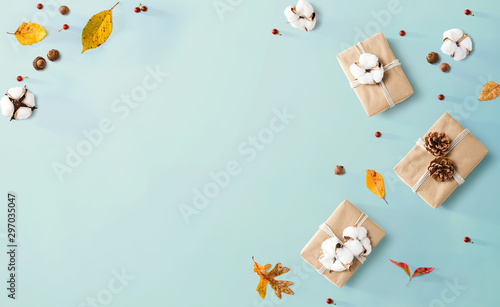 Gift boxes with autumn theme - overhead view flat lay