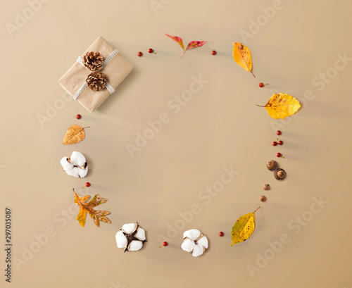 Gift box with autumn theme - overhead view flat lay