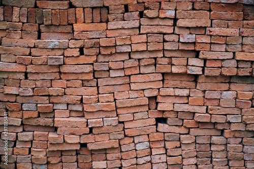The pattern of the bricks that are stacked    