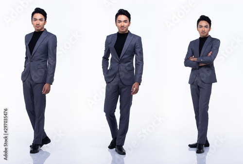 Obraz na plátně Full Length Snap Figure, Asian Business Man Stand in dark Black proper Suit pant