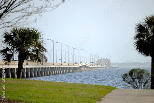 Bridge stretches three miles across the bay, carrying four lanes of traffic. photo