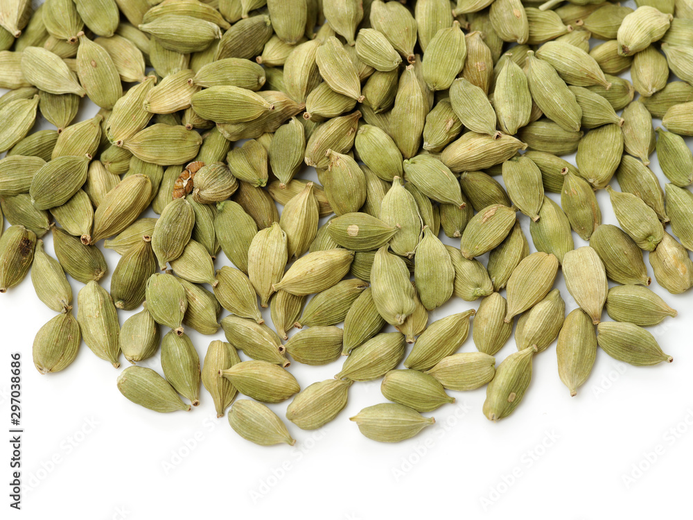 Green cardamom pods on white background Green cardamom pods on white background