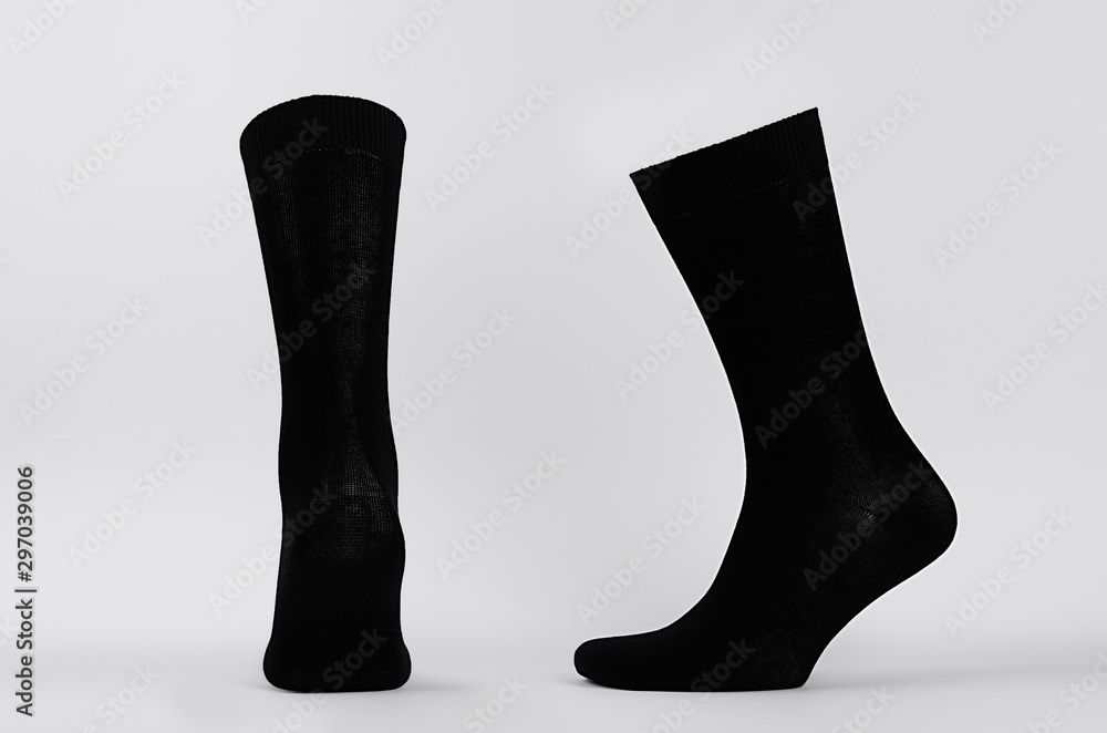 Blank black cotton high socks on invisible mannequin foot as mock up ...