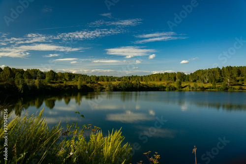 Landscape with lake and blue sky