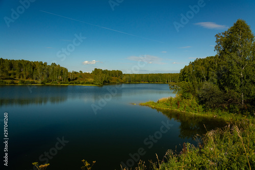 Landscape with lake and blue sky