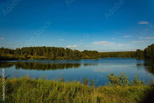 Landscape with lake and blue sky