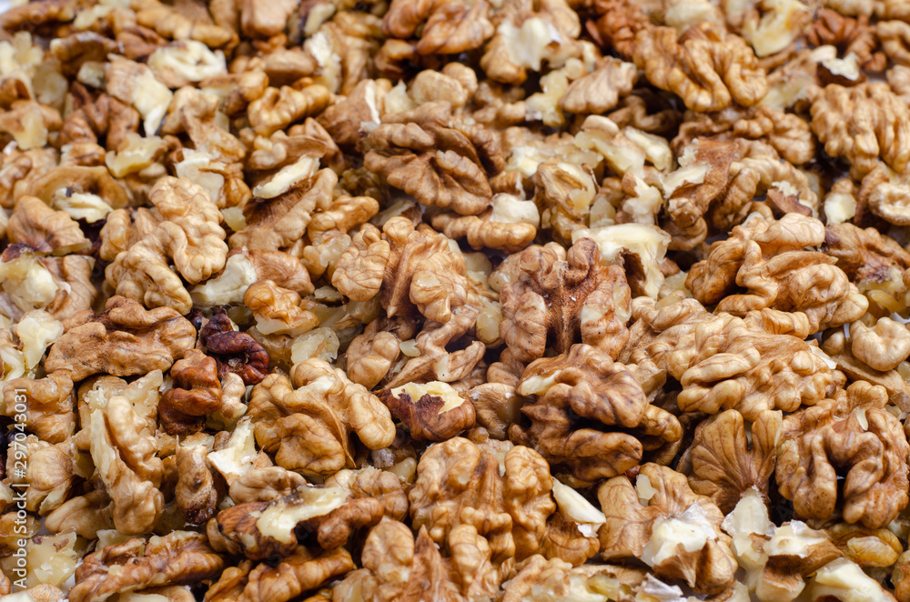 Texture of peeled walnuts full filling background Texture of peeled walnuts full filling background