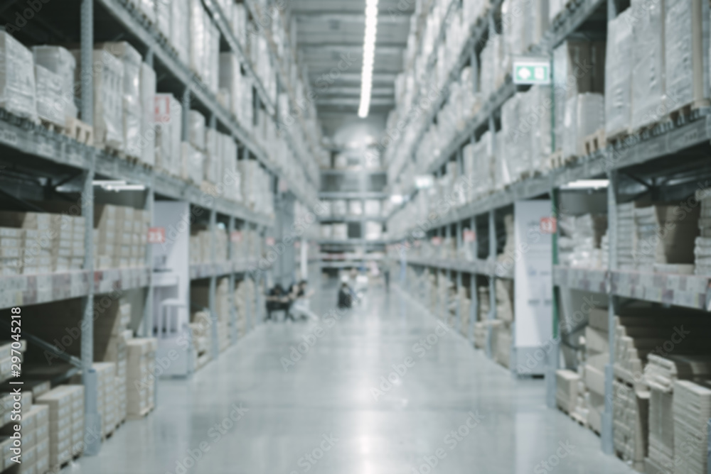Warehouse industry blur background with logistic wholesale storehouse, Products on shelf.