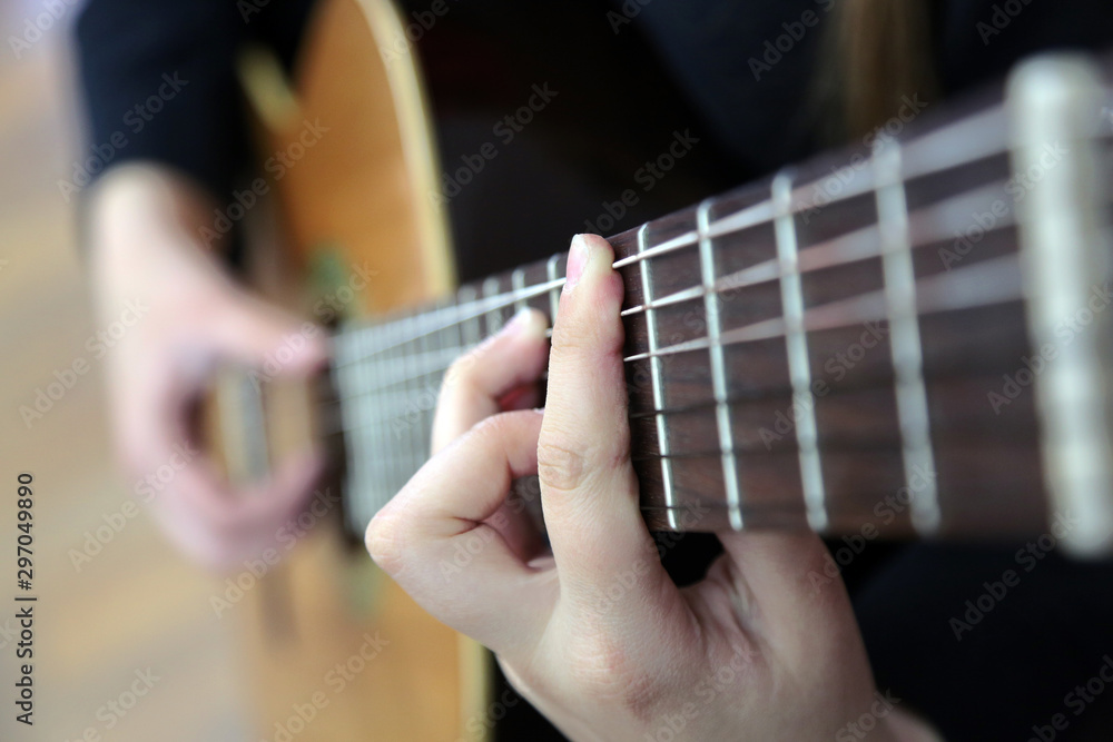 Fototapeta premium closeup of guitar player's hand